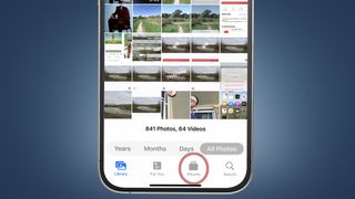 写真アプリを表示している iPhone