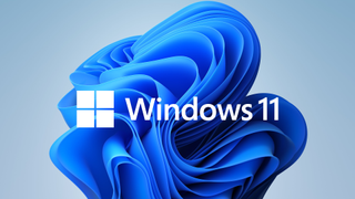 新しい壁紙の前にある Windows 11 のロゴ