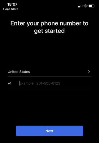 Signal iOS アプリの電話番号入力ページのスクリーンショット。