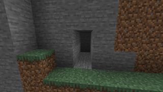 Minecraft の家 - 石の丘にある小さなボルト穴